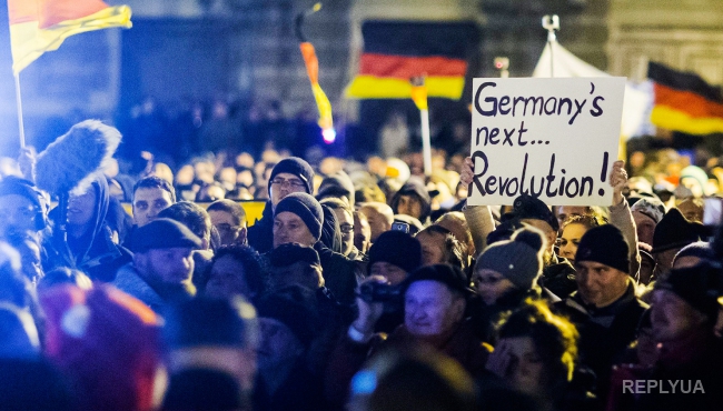 Немцы вышли на улицы Берлина с требованием отменить свободную торговлю с США