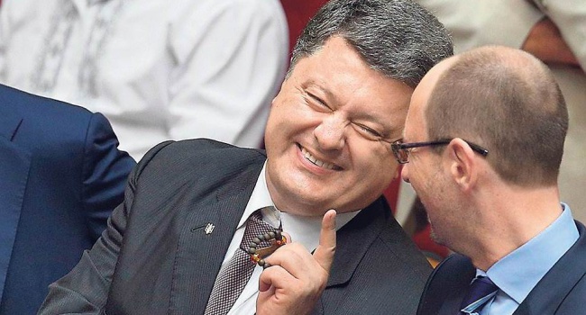 Политолог рассказал, что думают на Западе о Яценюке и Порошенко