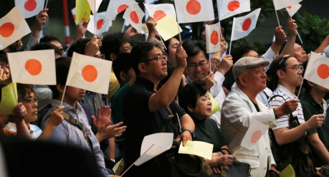 Правящая коалиция в Японии одержала сокрушительную победу