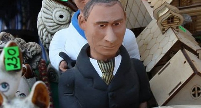 Крымчане зарабатывают деньги на Путине, - фото