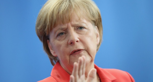 Жители Германии винят в терактах Ангелу Меркель