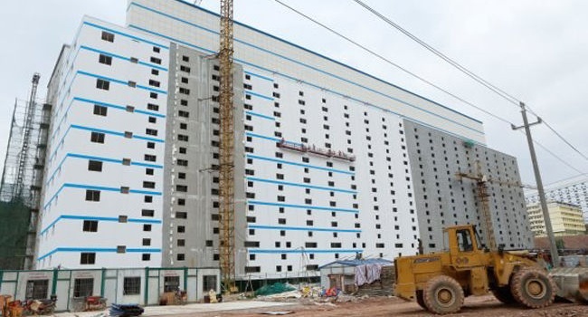 В Китае строят многоэтажные свинофермы