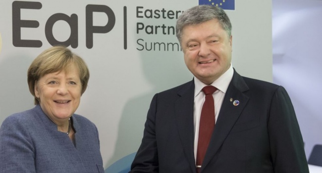 Политолог рассказал, почему Меркель провела экстренный телефонный разговор с Порошенко в преддверии встречи с Путиным