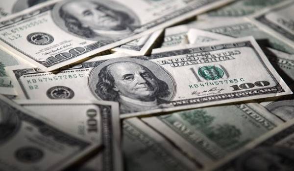  Нацбанк опять снизил официальный курс доллара 