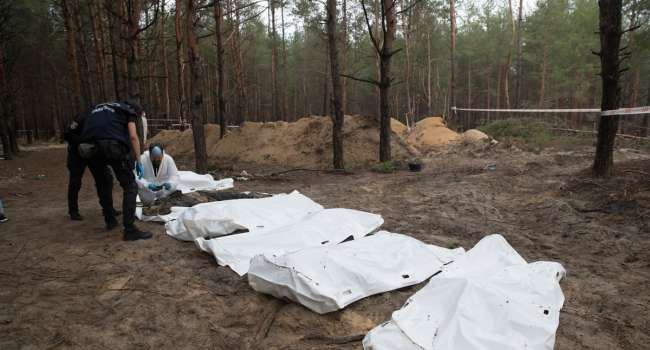 Полиция обнаружила еще три массовых захоронения украинцев в Харьковской области